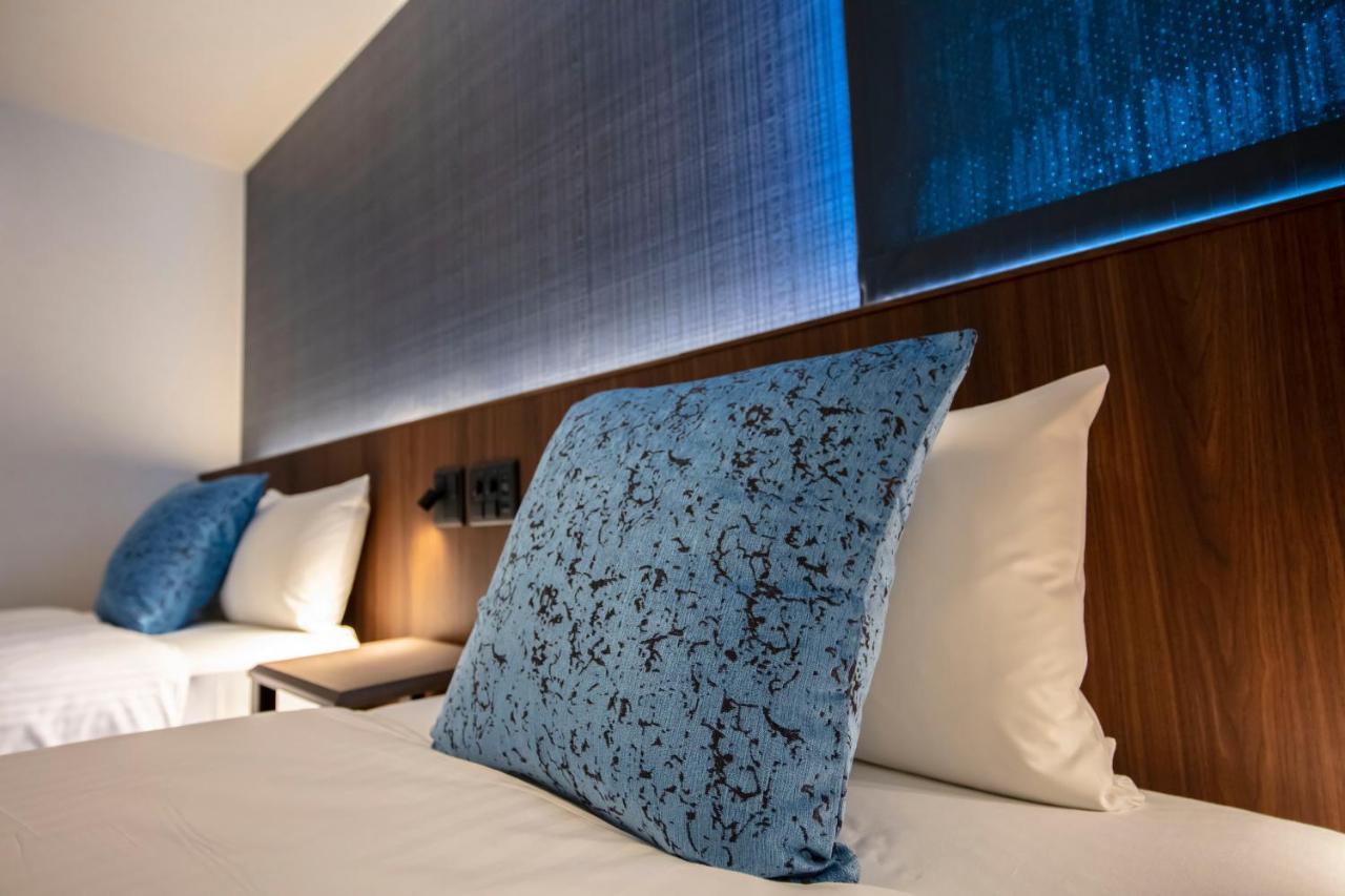Aparthotel Grand Base Okayama Ekimae Zewnętrze zdjęcie